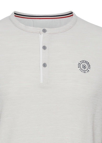 Grandad collar long sleeve tee in chalk, showing close up details.