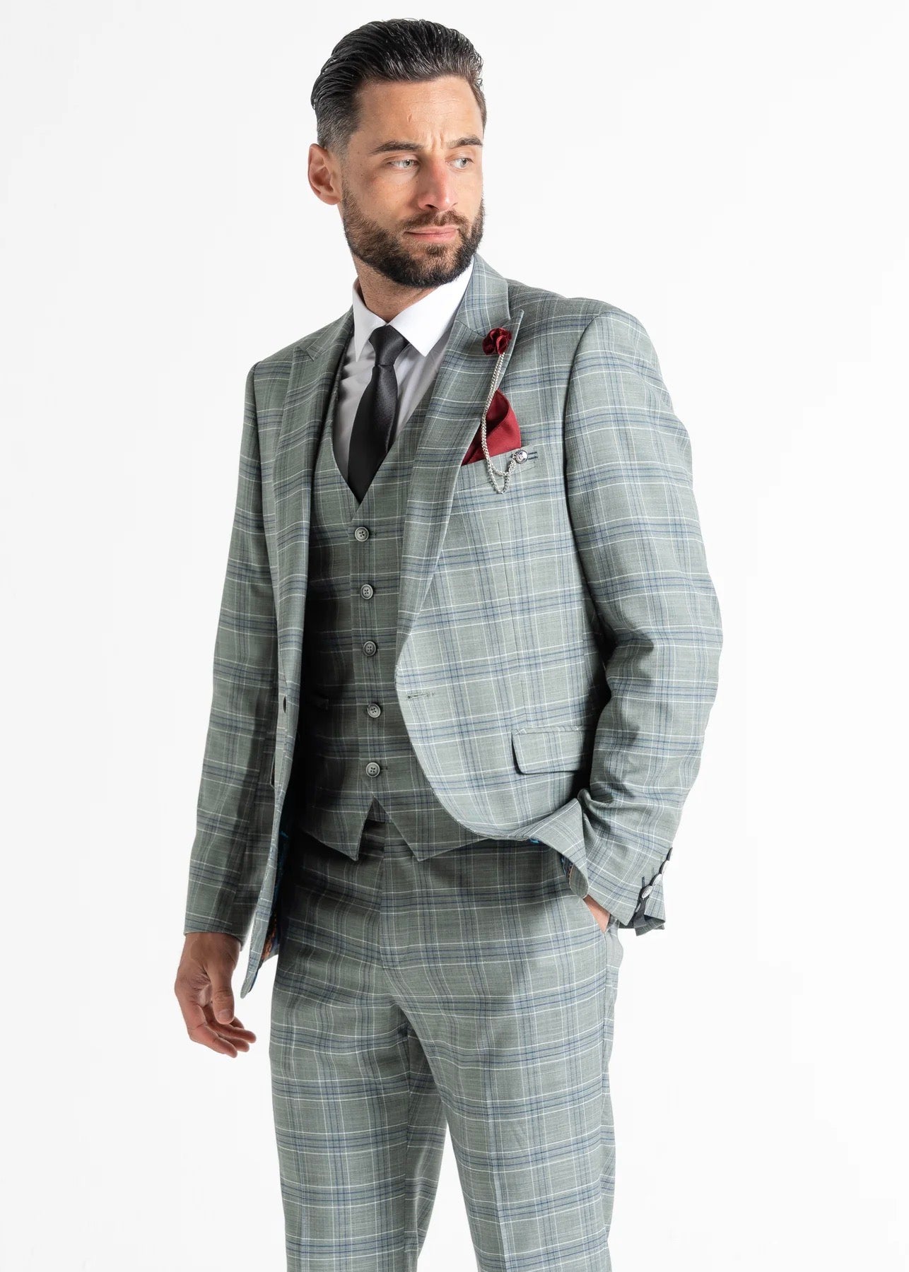 Model wearing Kensington Olive Suit faces away from camera whilst showing front details.