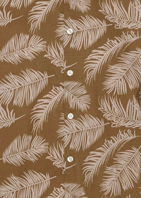 Close up on palm leaf pattern details.