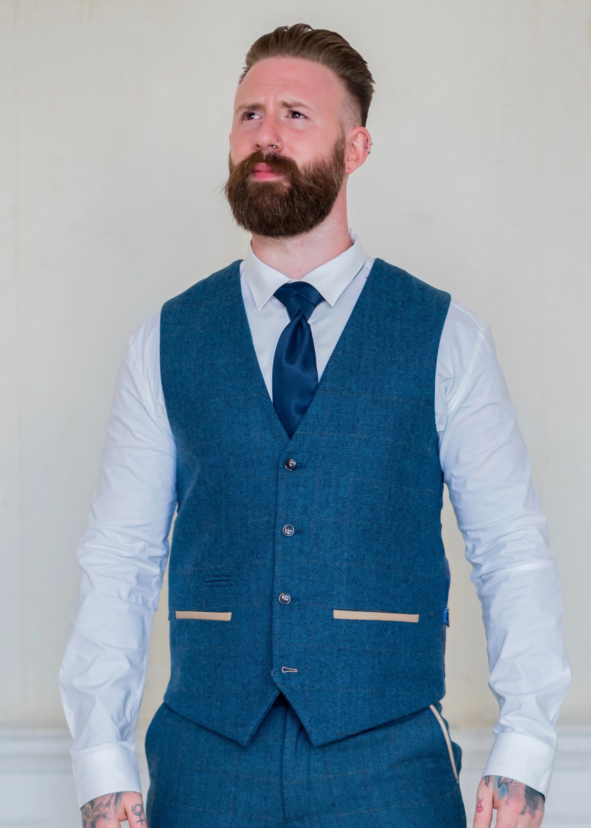 Marc Darcy Dion Tweed Waistcoat with navy tie and crisp white shirt.