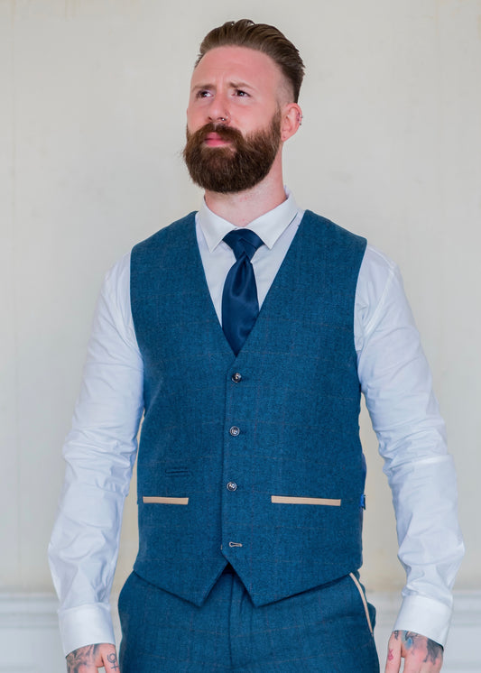 Marc Darcy Dion Tweed Waistcoat with navy tie and crisp white shirt.