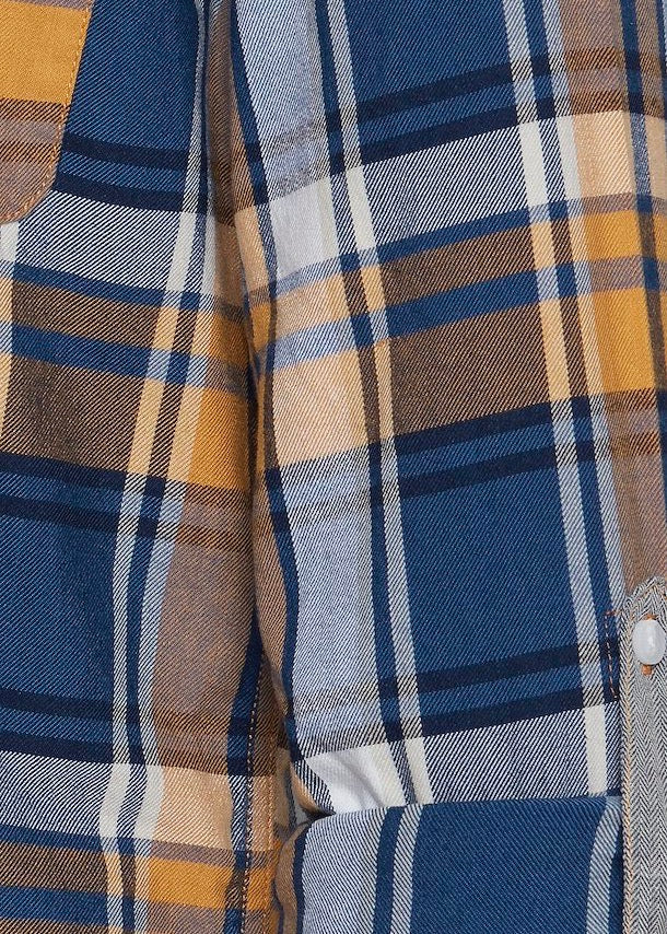 Lumberjack shirt butterscotch blue with orange butterscotch base tones with blue & navy checked detail. Close up of pattern.