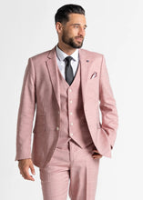 Load image into Gallery viewer, Model wearing Pastel Pink Edward Suit faces slightly away from camera. Closer up image of details of pink men&#39;s suit.
