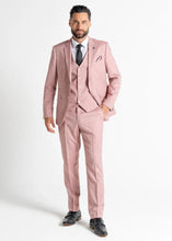 Load image into Gallery viewer, Model wearing Pastel Pink Edward Suit faces the camera wearing all three pieces of his pink suit for men.
