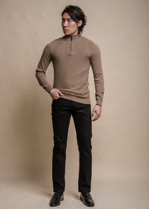 Fawn colour knitted jumper for men with half-zip, showing front from distance.