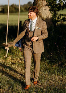 Joe's Countryside Wedding Suit with a men's brown suit, men's white shirt. and men's sage tie.