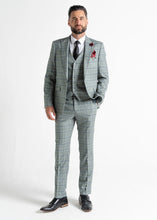 Load image into Gallery viewer, Model wearing Kensington Olive Suit faces camera, showing front details of the suit for men.
