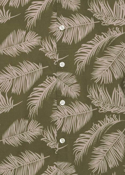 Short-sleeve shirt for men with an olive colour and palm leaf pattern showing close up on fabric.