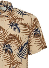 Load image into Gallery viewer, Short-sleeve button-up shirt for men with tropical leaf design in tan, showing close detailing.
