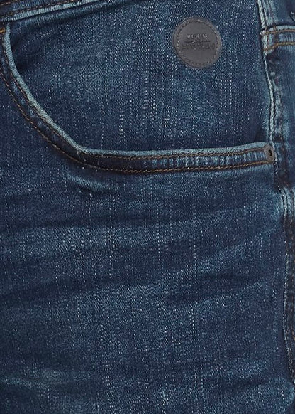 Twister fit dark blue jeans for men. Close up on details.