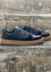 Casual Black trainers with brown sole. Comfortable footwear to wear with jeans, chinos or shorts in any season.