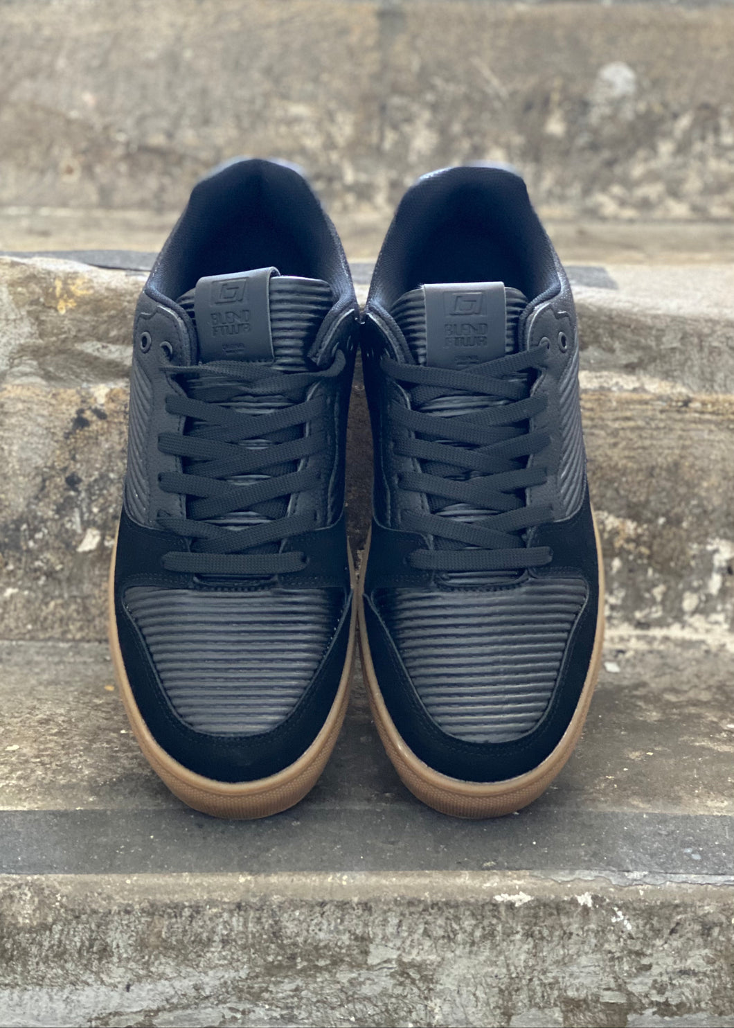 Casual Black trainers with brown sole. Comfortable footwear to wear with jeans, chinos or shorts in any season.