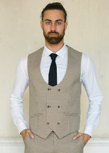 Cavani Elwood Houndstooth Checked Waistcoat worn with matching trousers, knit tie and white shirt. Modern combination for a wedding or another formal occasion