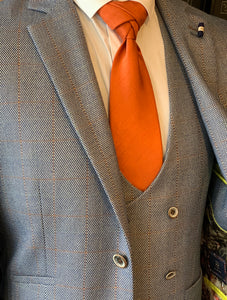 Cavani Del Ray Checked Waistcoat with matching suit jacket and orange tie. Smart menswear outfit choice for formal occasions
