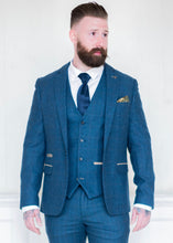 Load image into Gallery viewer, Marc Darcy Dion Tweed Jacket styled with matching waistcoat and trousers. Tattooed model also wearing tie to compliment the suit and a crisp white shirt. 
