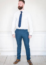 Load image into Gallery viewer, Marc Darcy Dion Tweed Trousers worn with brown brogues and a tie to compliment the navy colours
