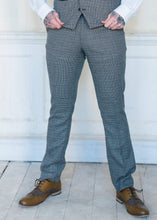 Load image into Gallery viewer, Marc Darcy Hardwick Checked Trousers worn with brown brogue style shoes
