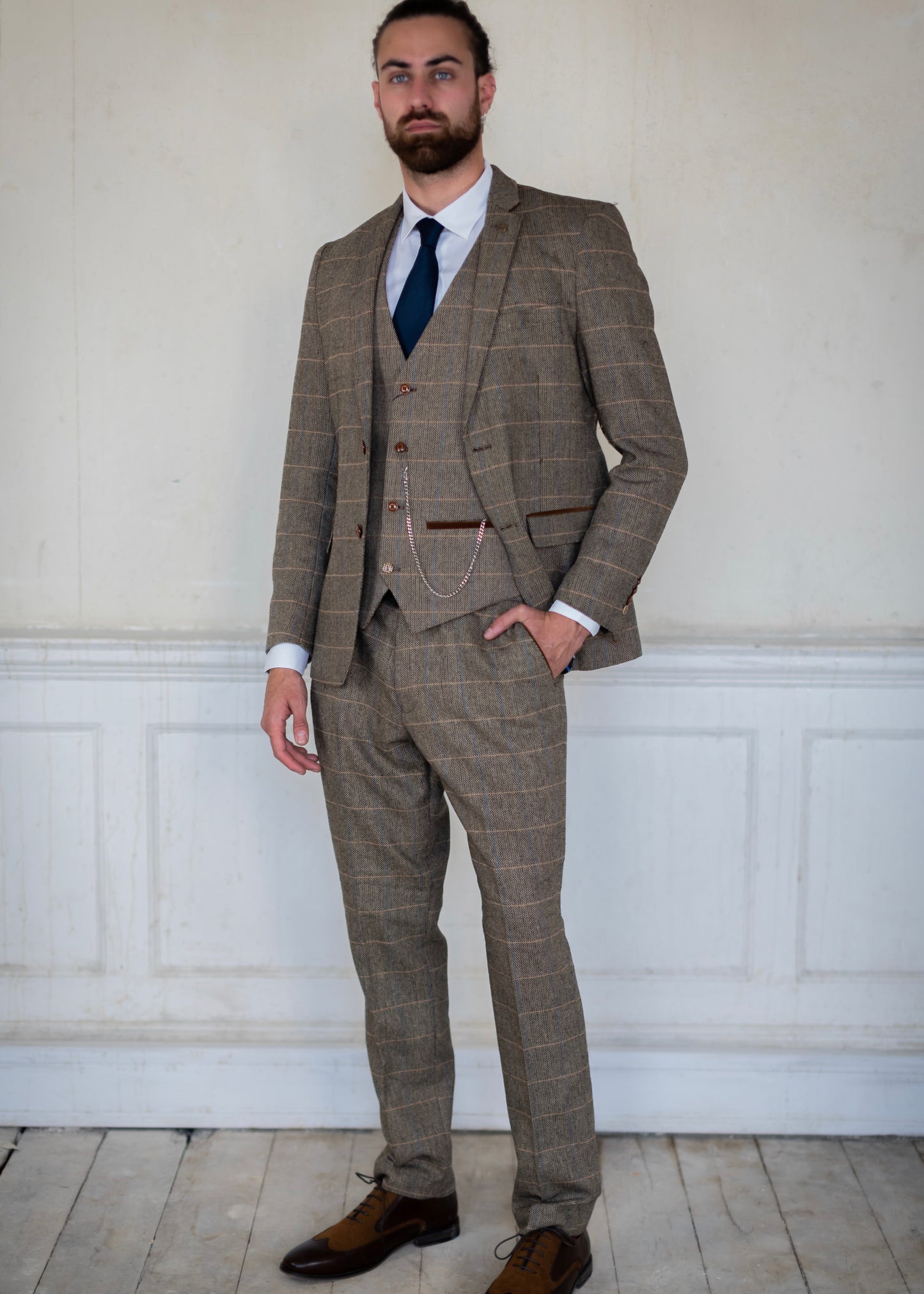 Marc Darcy Ted Tan Tweed 3-Piece Suit worn with brown shoes and navy tie