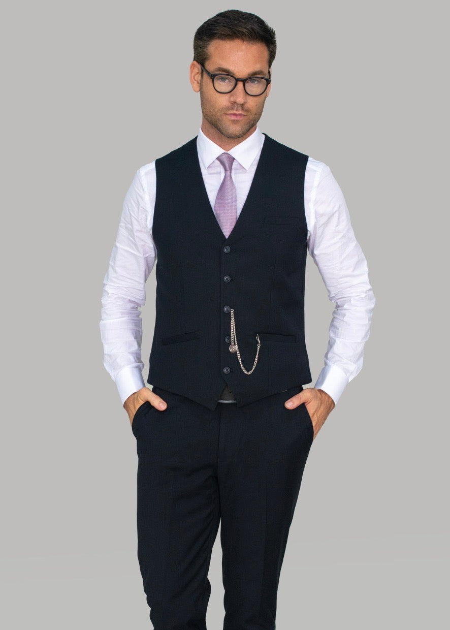 Model wearing the Cavani Marco in a waistcoat and trousers with a white shirt. 