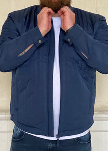 Quilted Jacket Petrol Blue. Stylish jacket worn with white pain Suave Owl T shirt