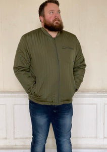 Quilted Jacket Dusty Olive. Lightweight quilted jacket.  Two external press stud fasten pockets & zipped chest pocket. Great coat worn with jeans