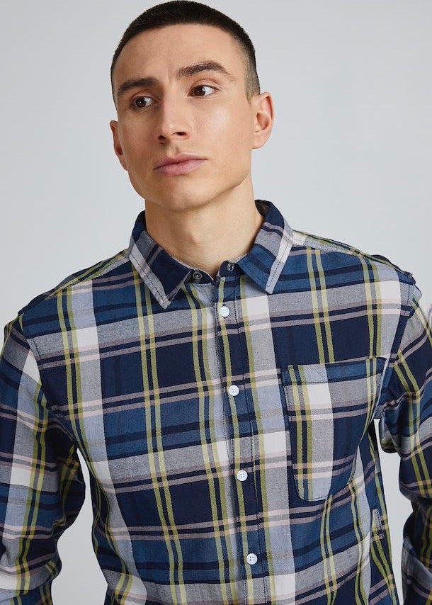 Lumberjack shirt vivid with blue base tones, pale pink & vivid yellow checked detail. On front-facing model.