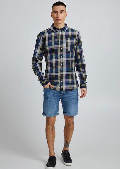 Lumberjack shirt vivid with blue base tones, pale pink & vivid yellow checked detail. Full body on model.