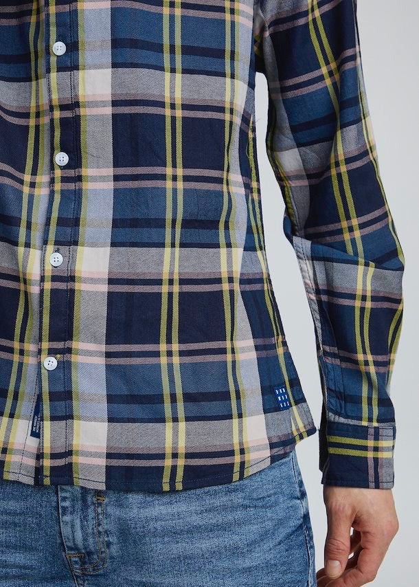 Lumberjack shirt vivid with blue base tones, pale pink & vivid yellow checked detail. Close up of lower shirt on model.