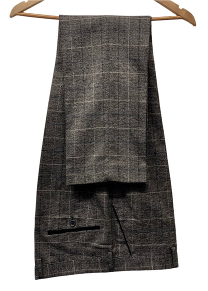 Marc Darcy Scott Grey Tweed Trousers hung up. Perfect menswear for office or formal attire