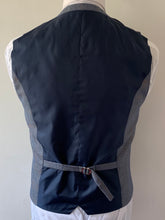 Load image into Gallery viewer, The reverse of a Cavani Del Ray Checked Waistcoat.
