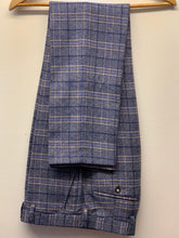 Load image into Gallery viewer, Robert Simon Marcello Blue Tweed Trousers hung up. Classic trousers for any business, formal occasion or wedding
