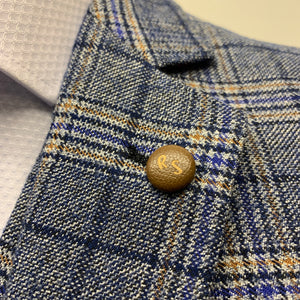 Top button of a Robert Simon Marcello Blue Tweed Jacket