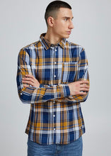 Load image into Gallery viewer, Lumberjack shirt butterscotch blue with orange butterscotch base tones with blue &amp; navy checked detail. Side profile on model.
